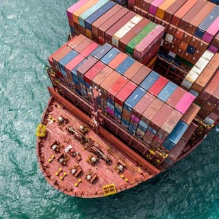 Shipping containers at a busy port